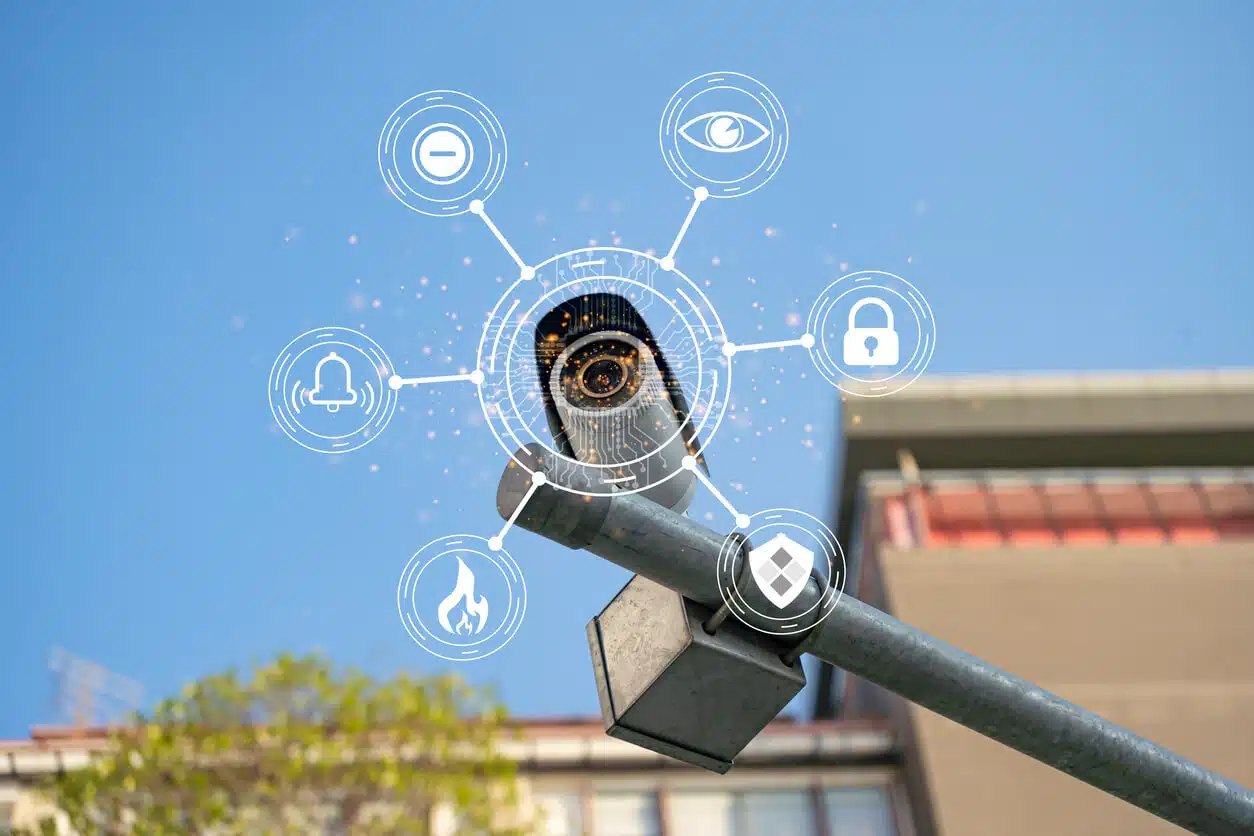 Security camera monitoring with digital security icons overlay.